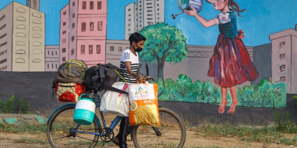 man with bike and bags